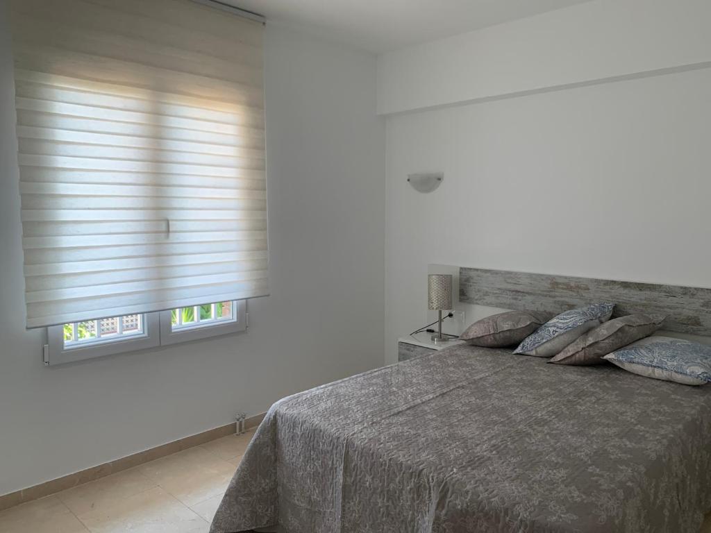 Postel nebo postele na pokoji v ubytování casa Salou individual