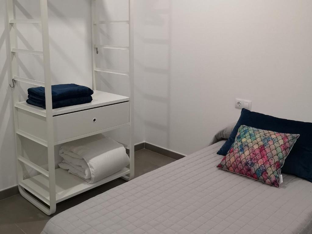 Postel nebo postele na pokoji v ubytování Villa Montaña Colorada