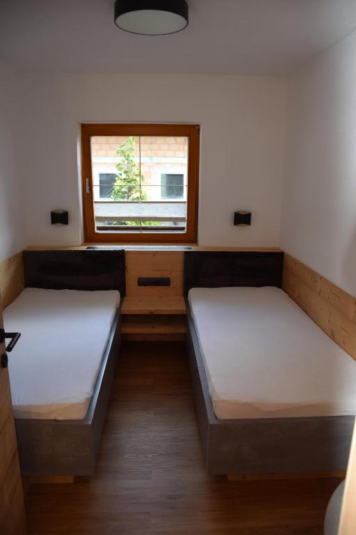 Postel nebo postele na pokoji v ubytování Haus Stefan