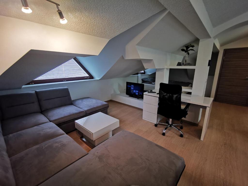 TV a/nebo společenská místnost v ubytování DB Bled Apartment