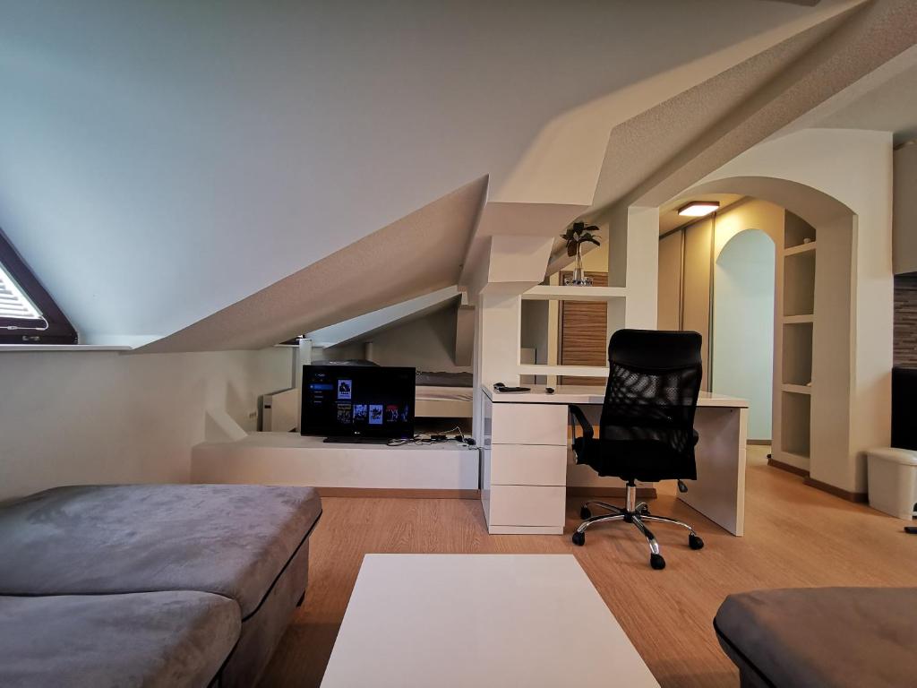 TV a/nebo společenská místnost v ubytování DB Bled Apartment