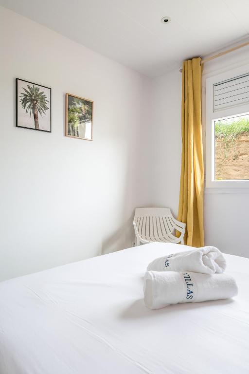 Postel nebo postele na pokoji v ubytování Sealake Villas
