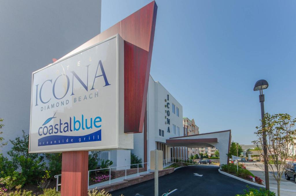 ICONA Diamond Beachに飾ってある許可証、賞状、看板またはその他の書類