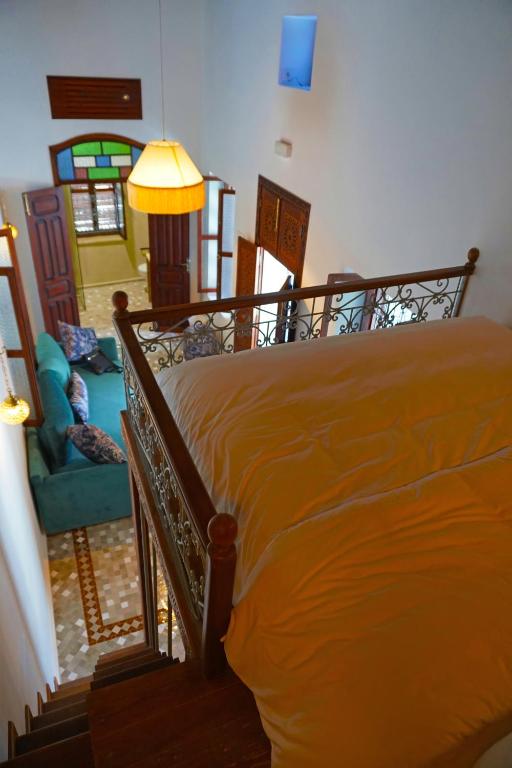 Una cama o camas en una habitación de Dar Fama