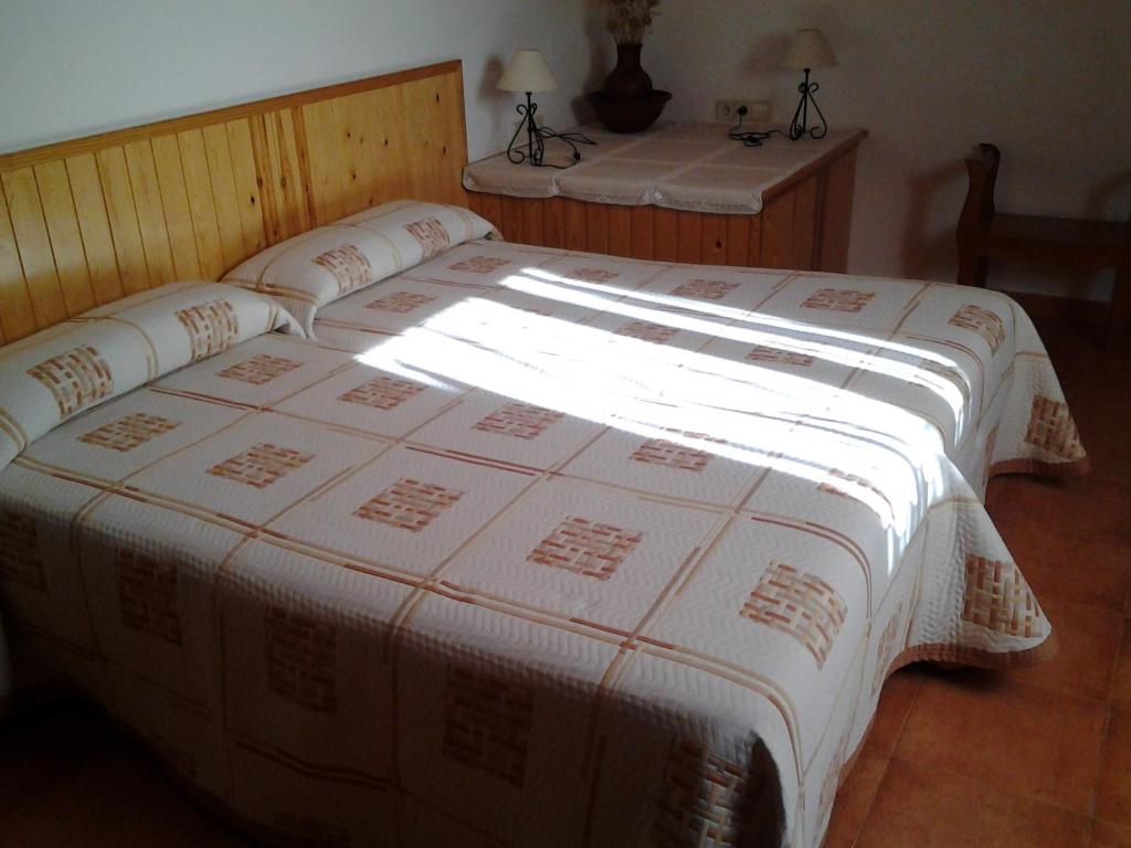 Postel nebo postele na pokoji v ubytování Casa Font de Seuri
