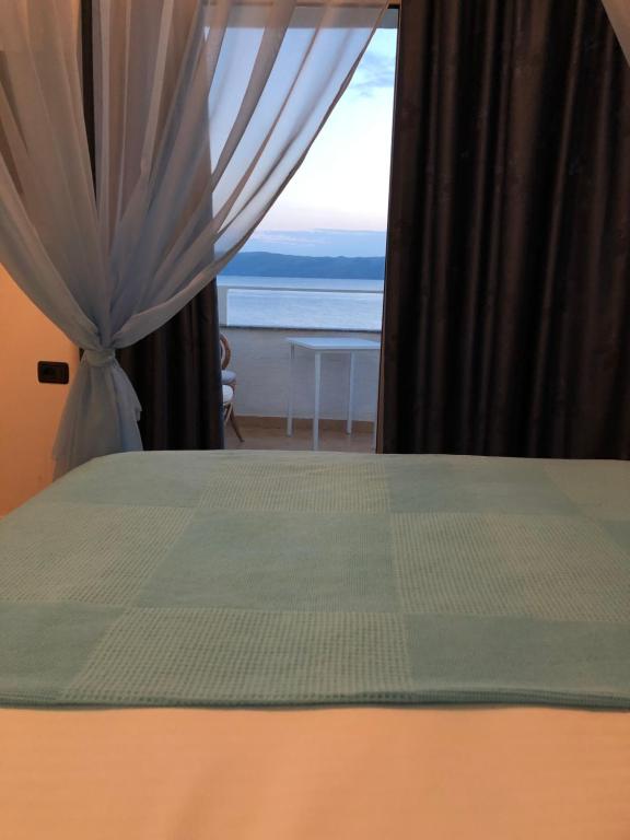 Postel nebo postele na pokoji v ubytování Envi Hotel