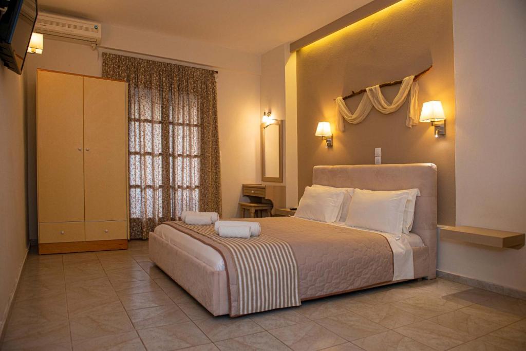 Postel nebo postele na pokoji v ubytování Hotel Marina