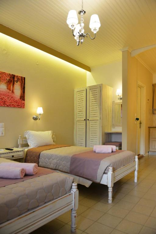 Postel nebo postele na pokoji v ubytování Hotel Marina