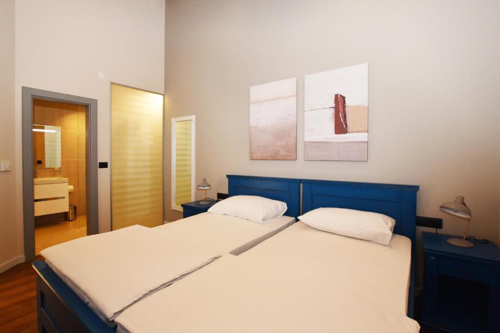Postel nebo postele na pokoji v ubytování Bed&Breakfast Monte Rosso