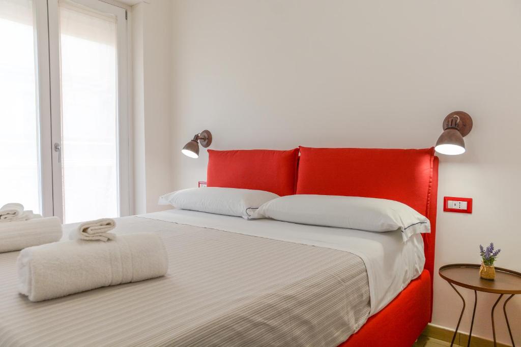 A bed or beds in a room at Casa Pisacane