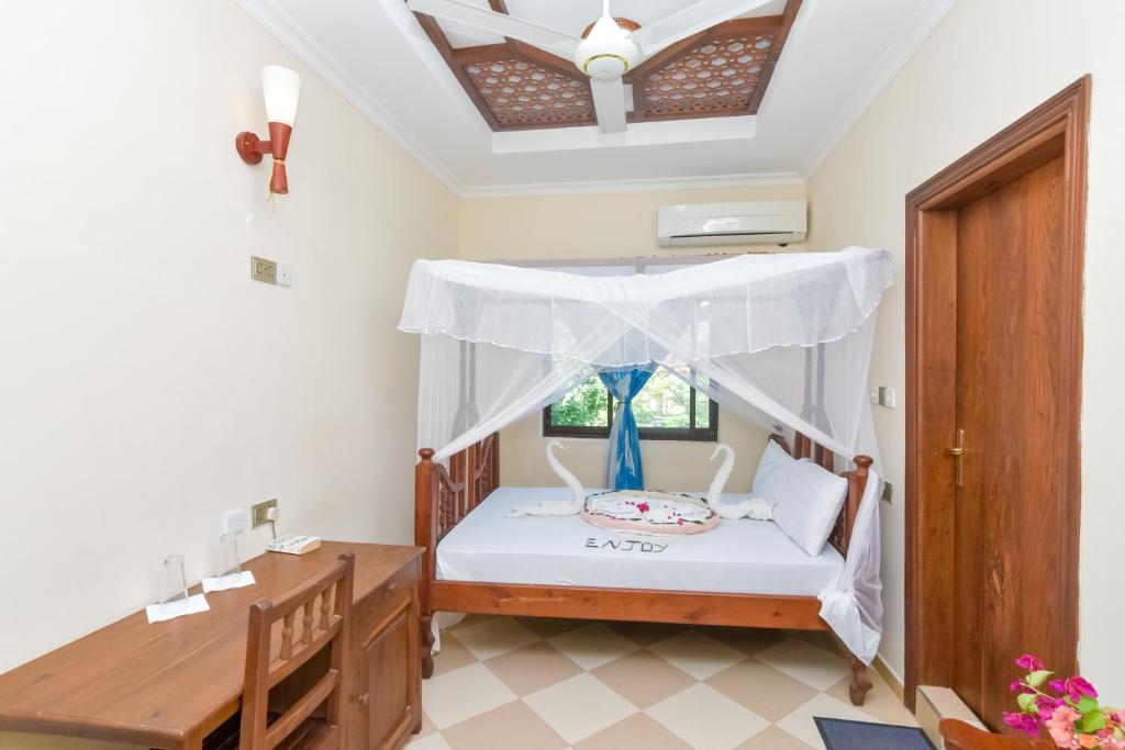 Postel nebo postele na pokoji v ubytování Ifa Beach Resort