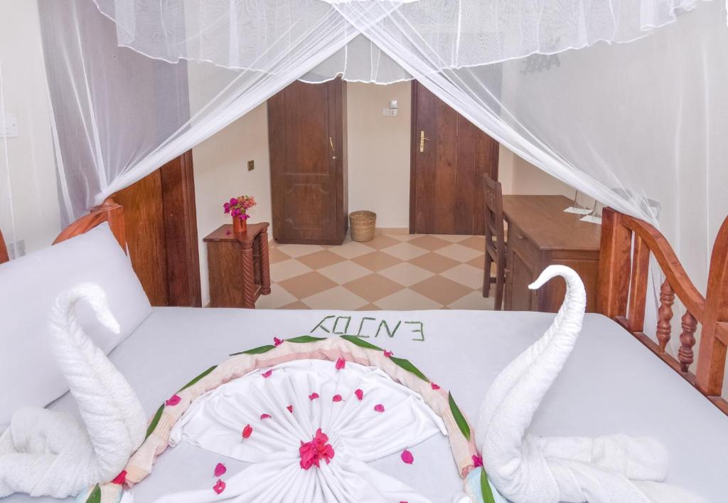 Postel nebo postele na pokoji v ubytování Ifa Beach Resort