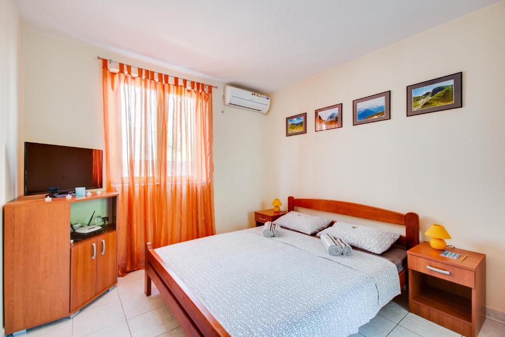 Postel nebo postele na pokoji v ubytování Villa Dionis