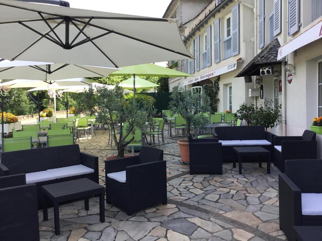 Vonkajšia záhrada v ubytovaní Hôtel des Barrages