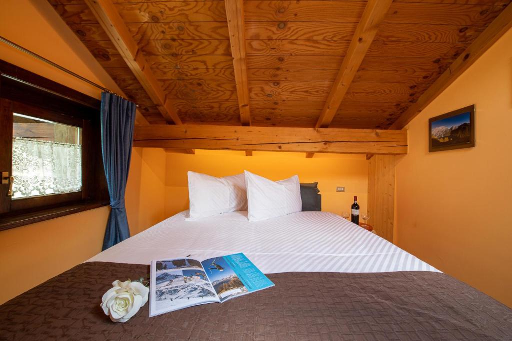 Łóżko lub łóżka w pokoju w obiekcie Chalet Rin Star