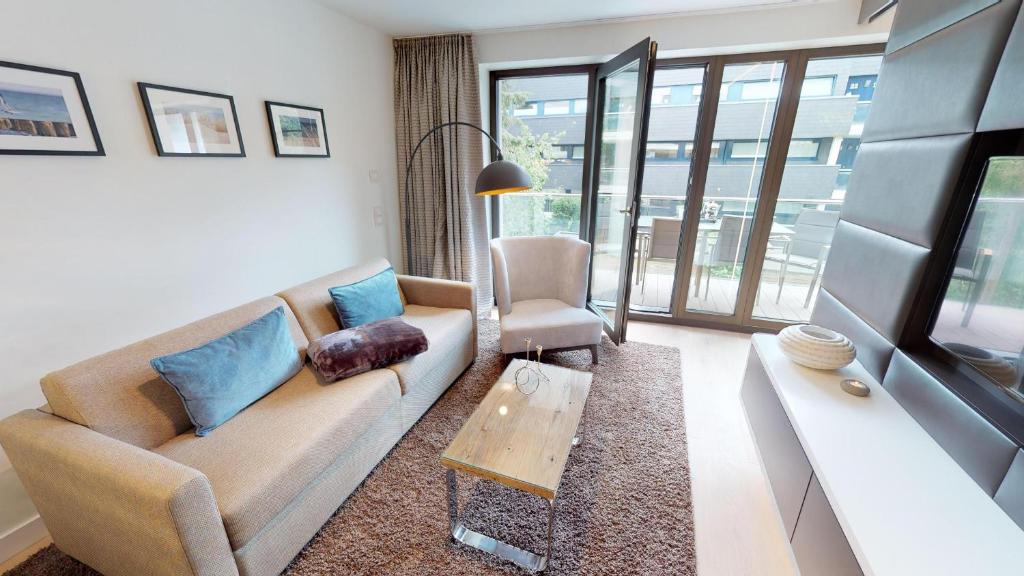 Posezení v ubytování White Pearl Apartment 1.03