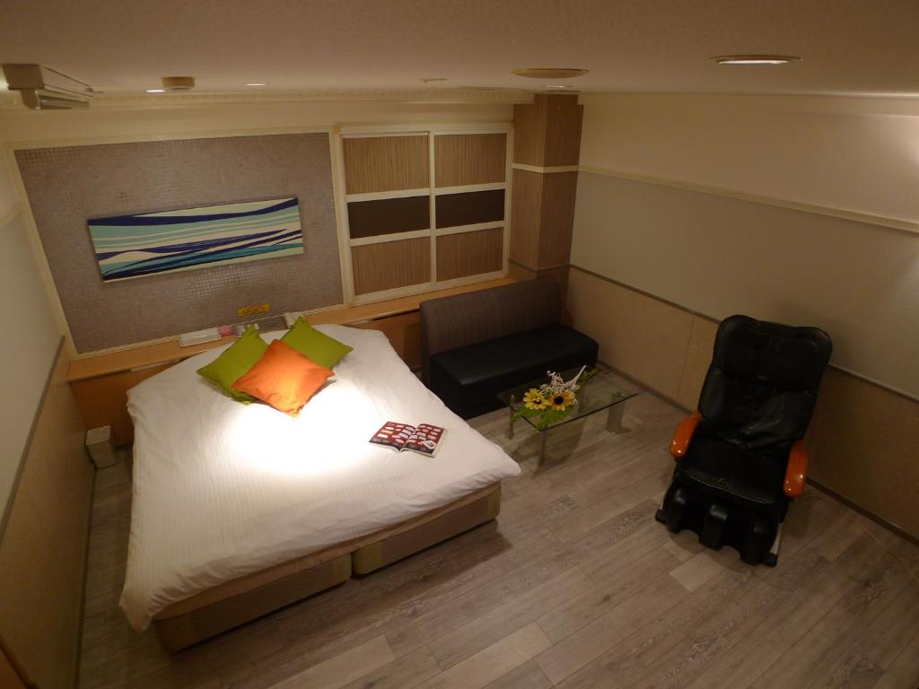 Postel nebo postele na pokoji v ubytování Hotel GOLF Hodogaya (Adult Only)