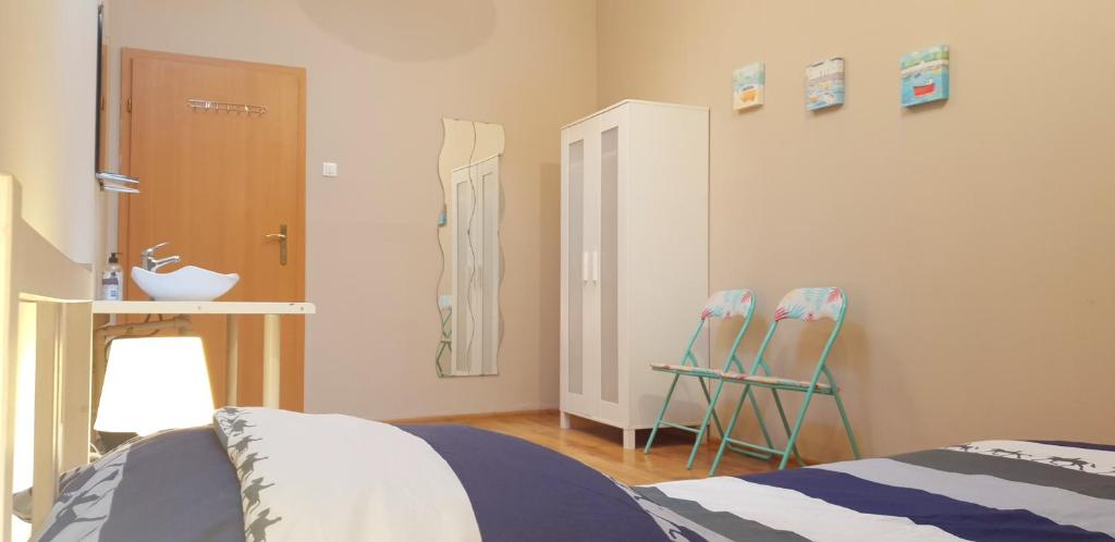 Postel nebo postele na pokoji v ubytování Smart Stay Hostel Gdynia