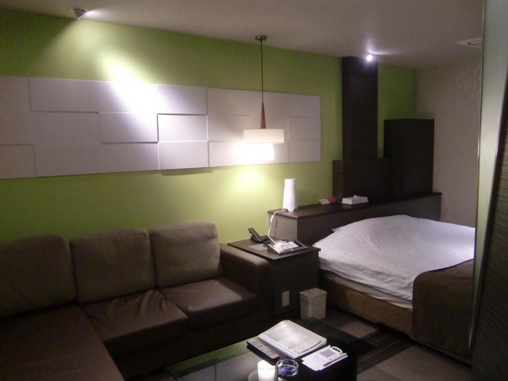 Postel nebo postele na pokoji v ubytování Hotel GOLF Nirasaki (Adult Only)