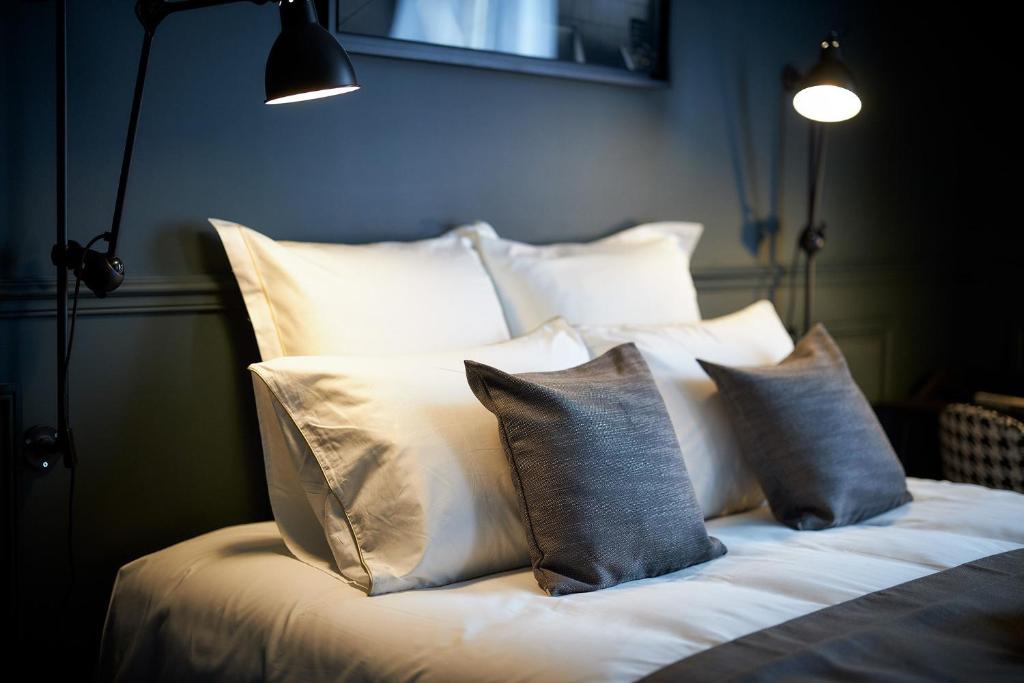 Postel nebo postele na pokoji v ubytování Hotel Victoria