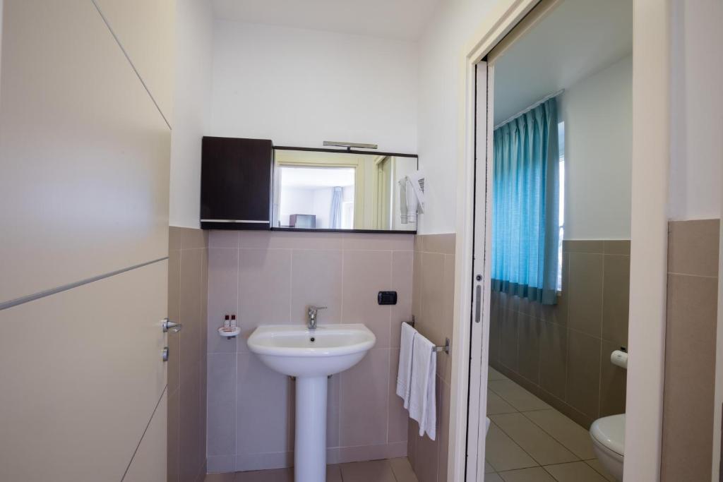 Kúpeľňa v ubytovaní Porta Pispini Residence