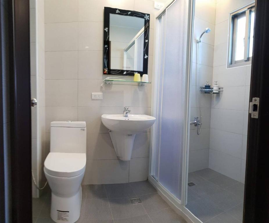 Koupelna v ubytování JiuZhiAn Apartment