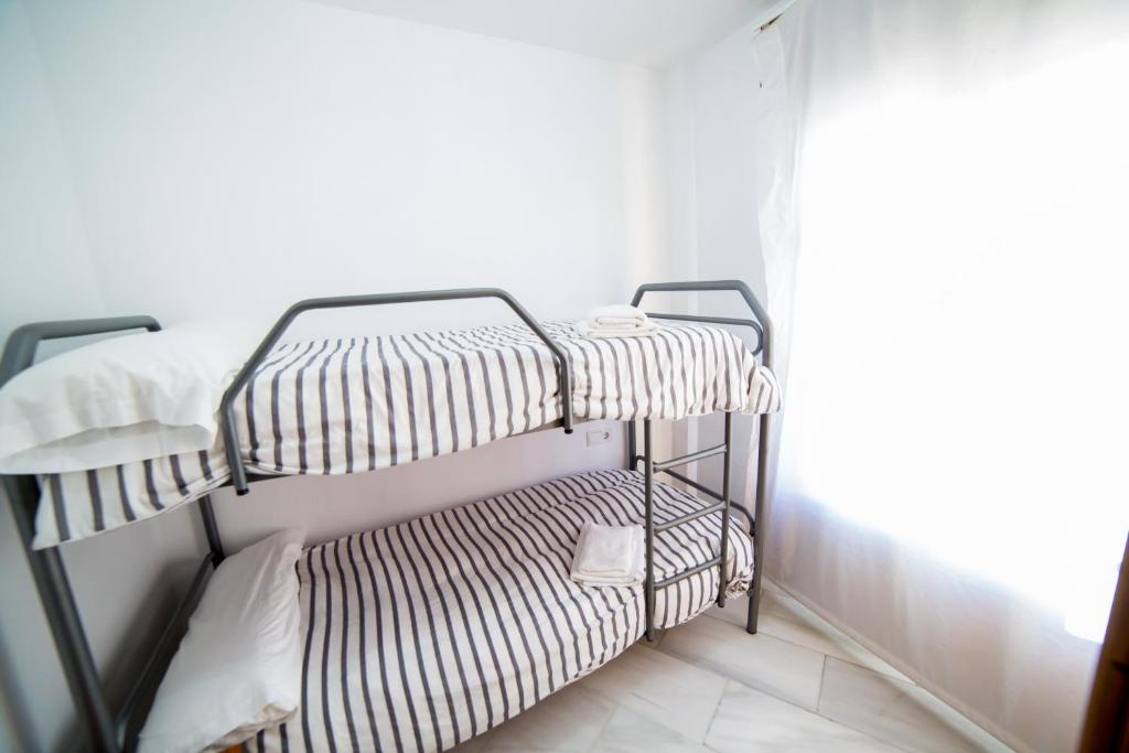 Postel nebo postele na pokoji v ubytování Casa junto a palacio de VIANA