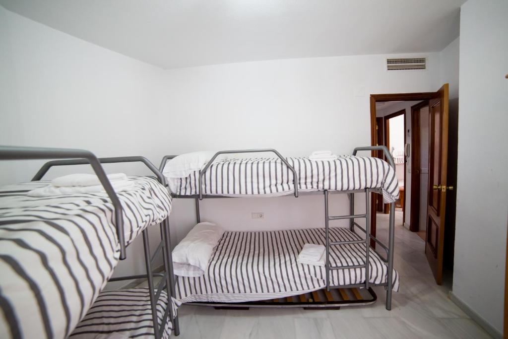Postel nebo postele na pokoji v ubytování Casa junto a palacio de VIANA