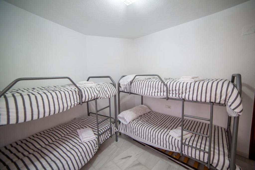 Postel nebo postele na pokoji v ubytování Casa junto a palacio de VIANA