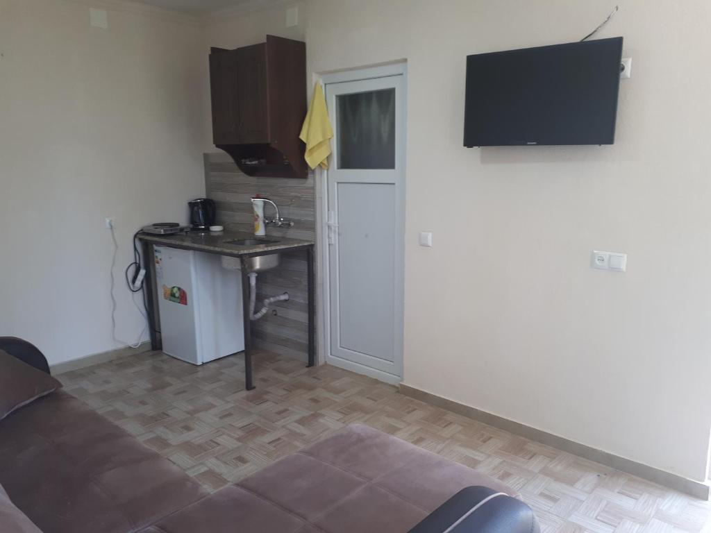 Kuchyň nebo kuchyňský kout v ubytování Kvariati Grand Guest House