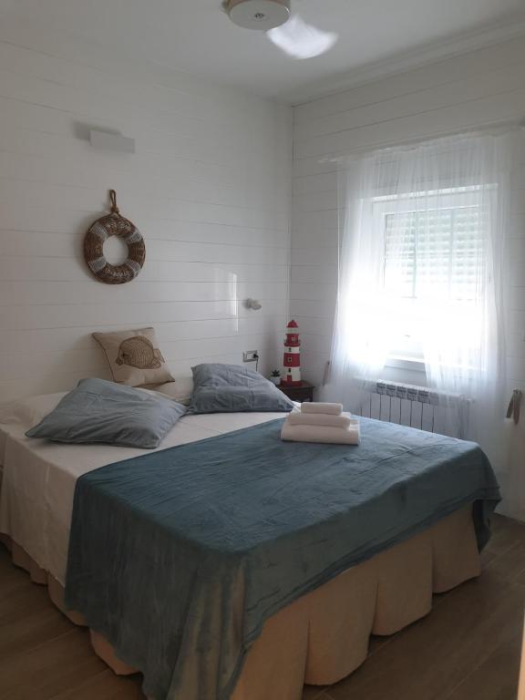 Postel nebo postele na pokoji v ubytování Laura e Christian - Rooms