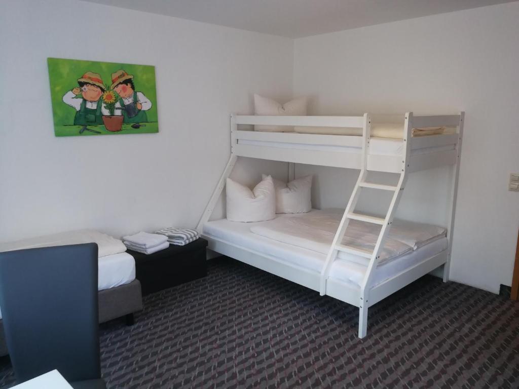 Postel nebo postele na pokoji v ubytování Hotel Sonne