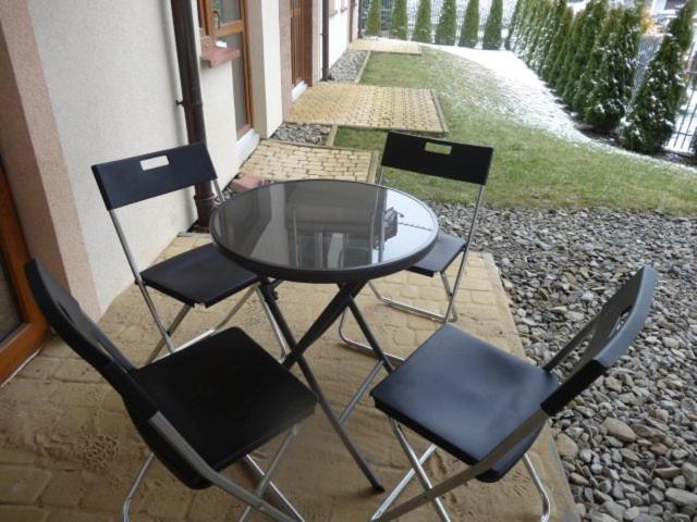 Patio alebo iná vonkajšia časť ubytovania MS APART Krynica Zdrój