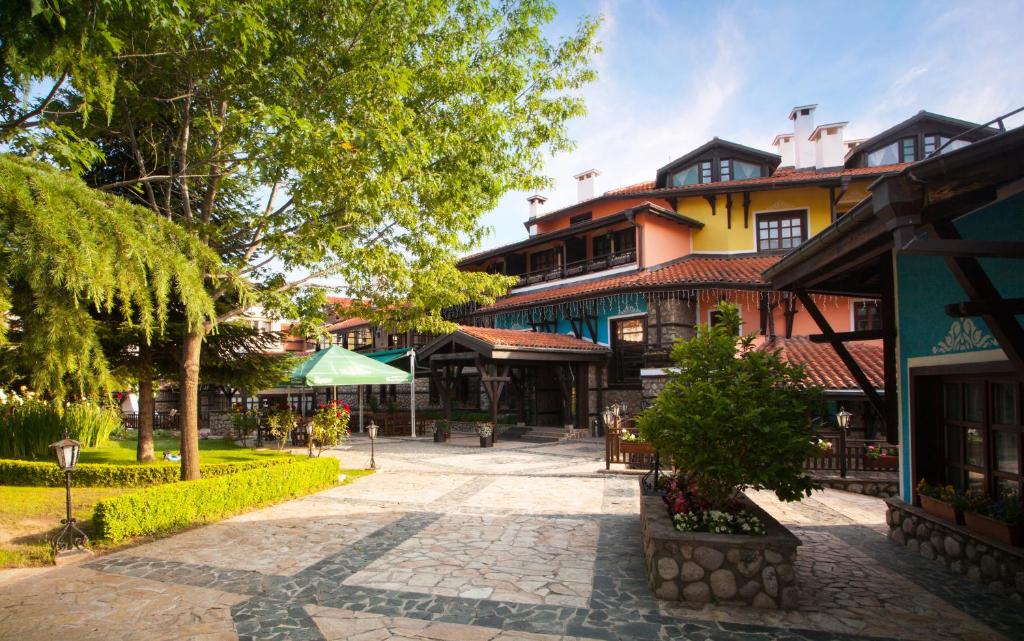 a street in a town with a building at Hotel Tanne in Bansko