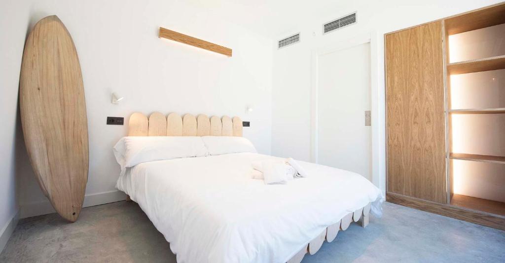 Postel nebo postele na pokoji v ubytování Moana Eco Surf House