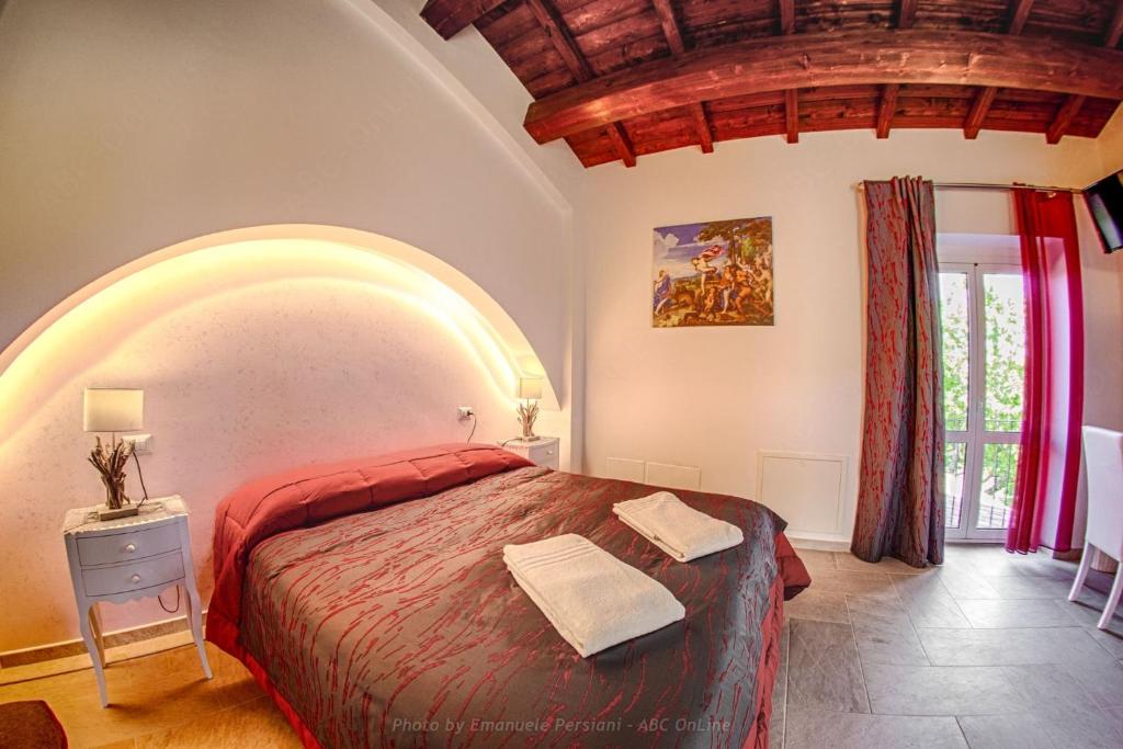 Postel nebo postele na pokoji v ubytování Agriturismo Baldassari