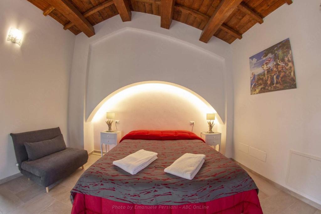 Postel nebo postele na pokoji v ubytování Agriturismo Baldassari