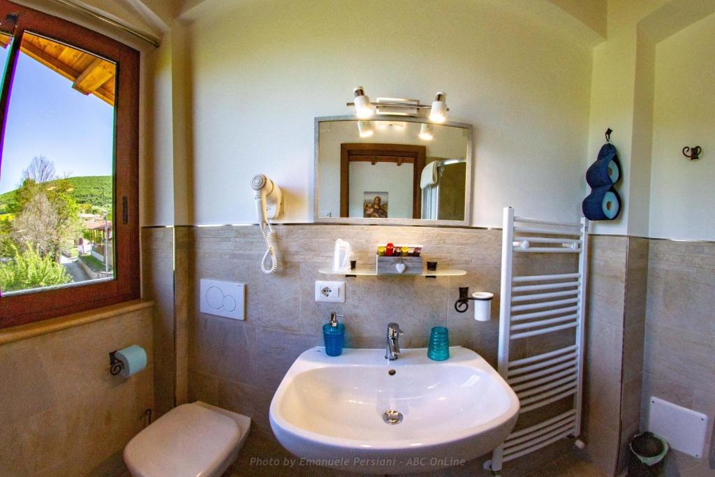 Koupelna v ubytování Agriturismo Baldassari