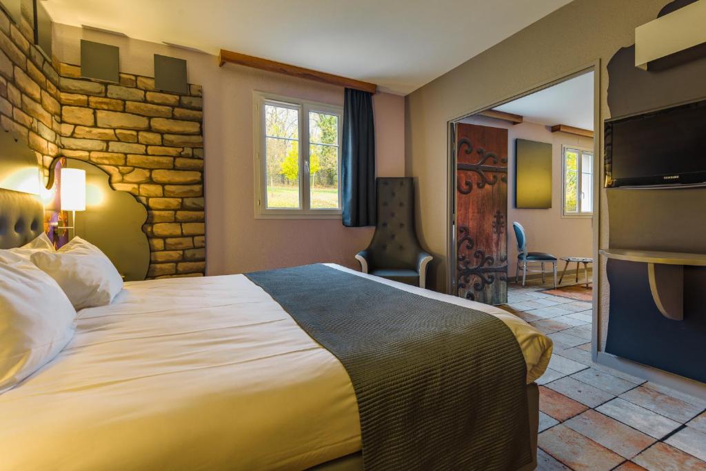 Letto o letti in una camera di Explorers Hotel Marne-la-Vallée