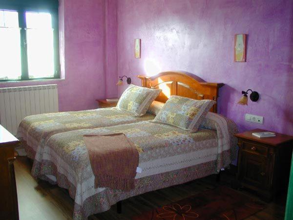 Postel nebo postele na pokoji v ubytování Hostería Casa Flor