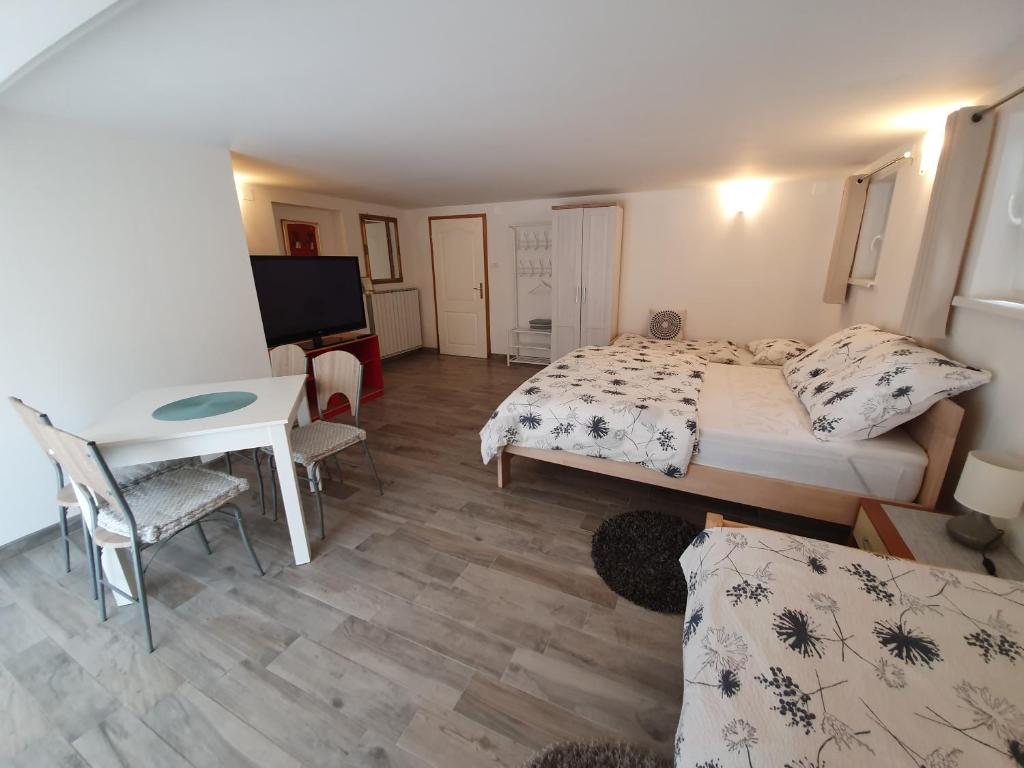 Postel nebo postele na pokoji v ubytování Rooms Jurca