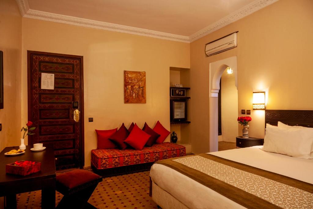Postel nebo postele na pokoji v ubytování Riad Marrakech By Hivernage
