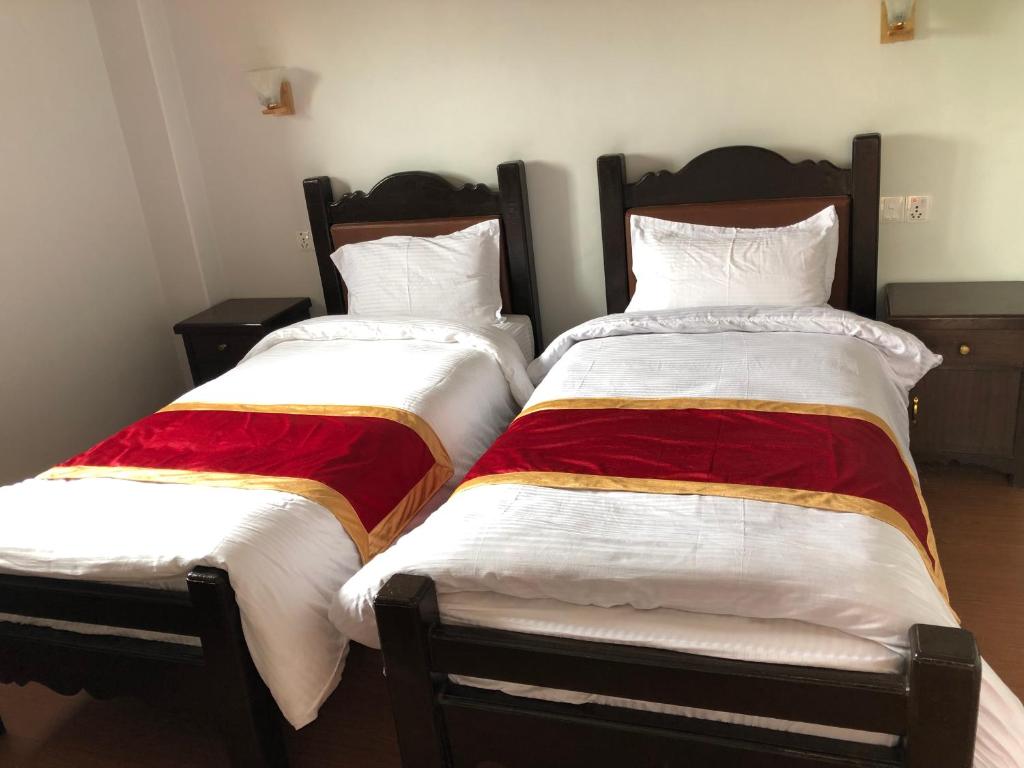 Voodi või voodid majutusasutuse The Hotel toas