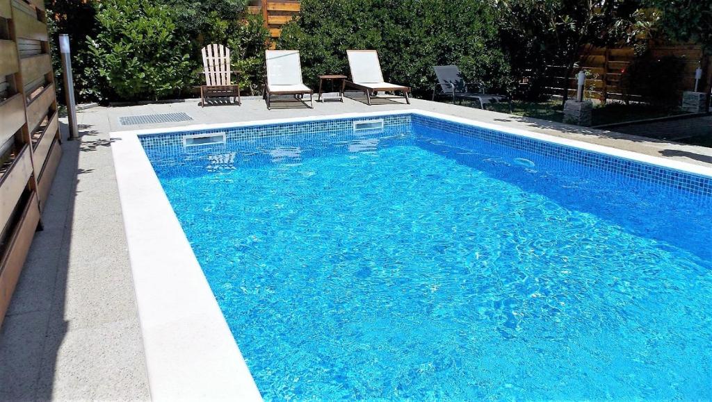 Bazén v ubytovaní Villa Šima- luxury apartment with private pool alebo v jeho blízkosti