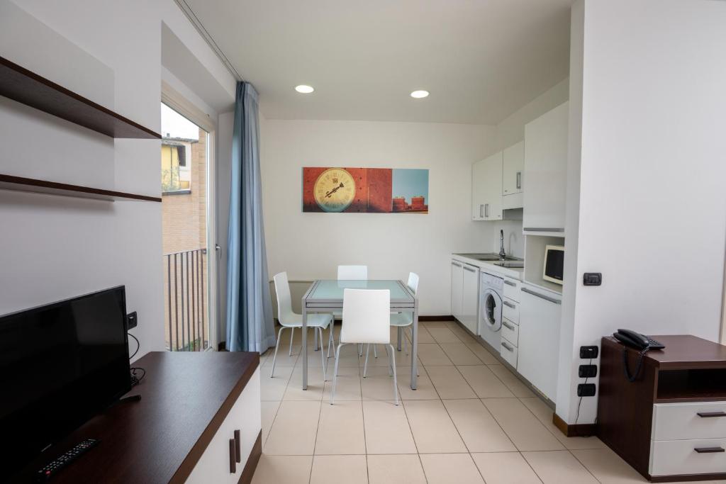 Kuchyňa alebo kuchynka v ubytovaní Porta Pispini Residence