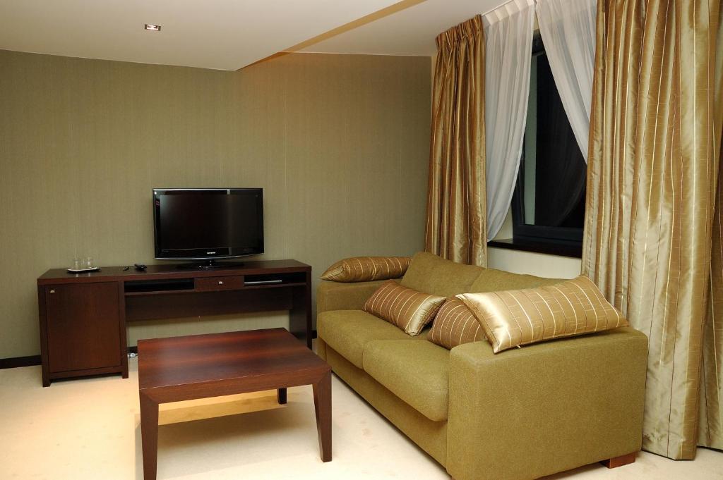 TV a/nebo společenská místnost v ubytování Hotel Predium