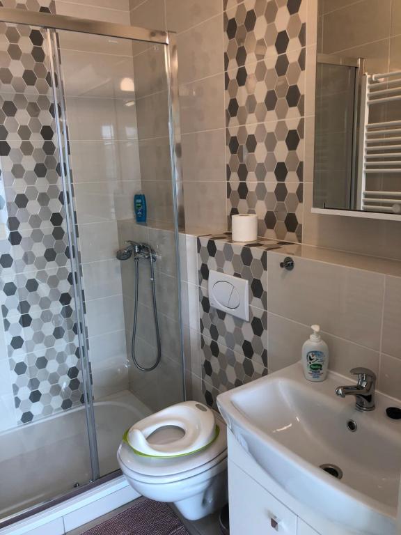 Koupelna v ubytování Apartmány LETO