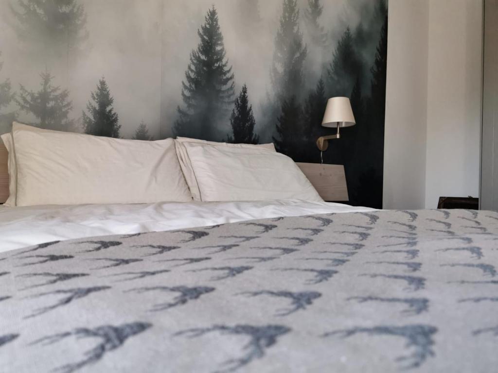 Postel nebo postele na pokoji v ubytování Affittacamere Casa Ester
