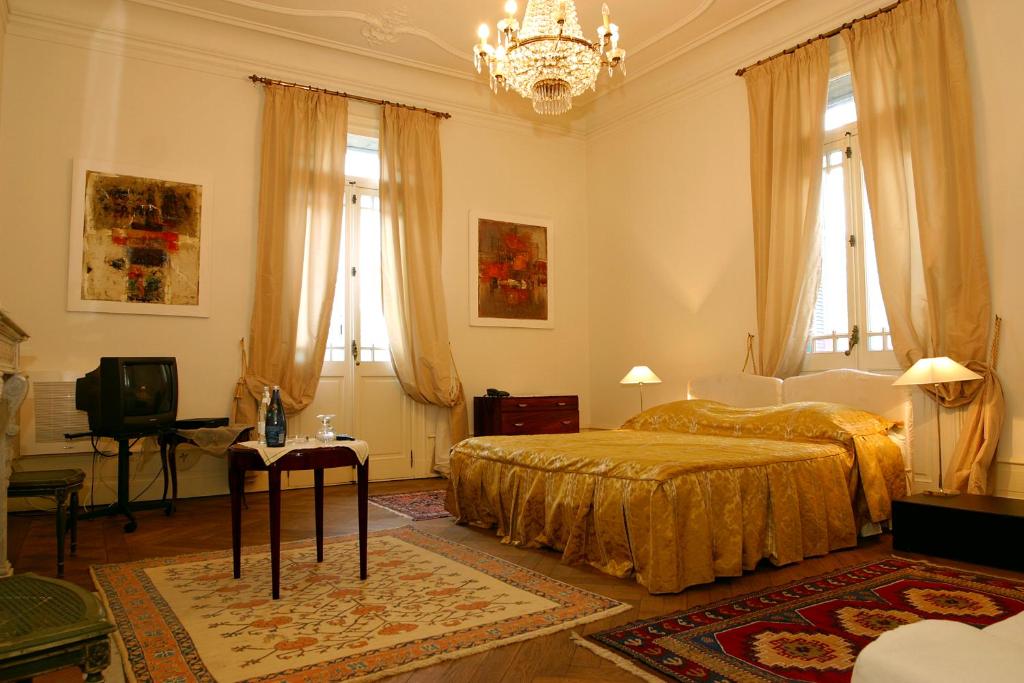 מיטה או מיטות בחדר ב-La Maison de Sophie