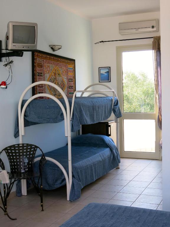 Posteľ alebo postele v izbe v ubytovaní Agriturismo Tenuta Del Morige